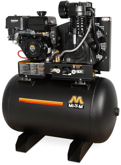 Mi-T-M gas powered two stage air compressor on a job site.